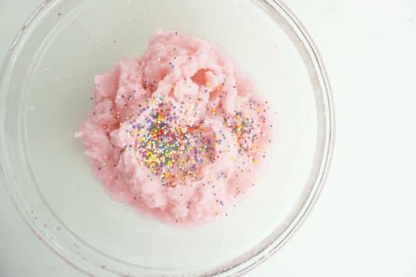 bowl of pink margarita with sprinkles on top