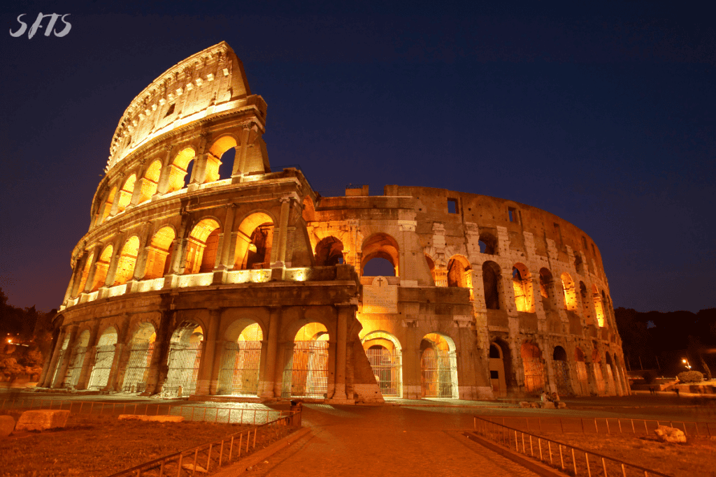 An image of The Colosseum at night.