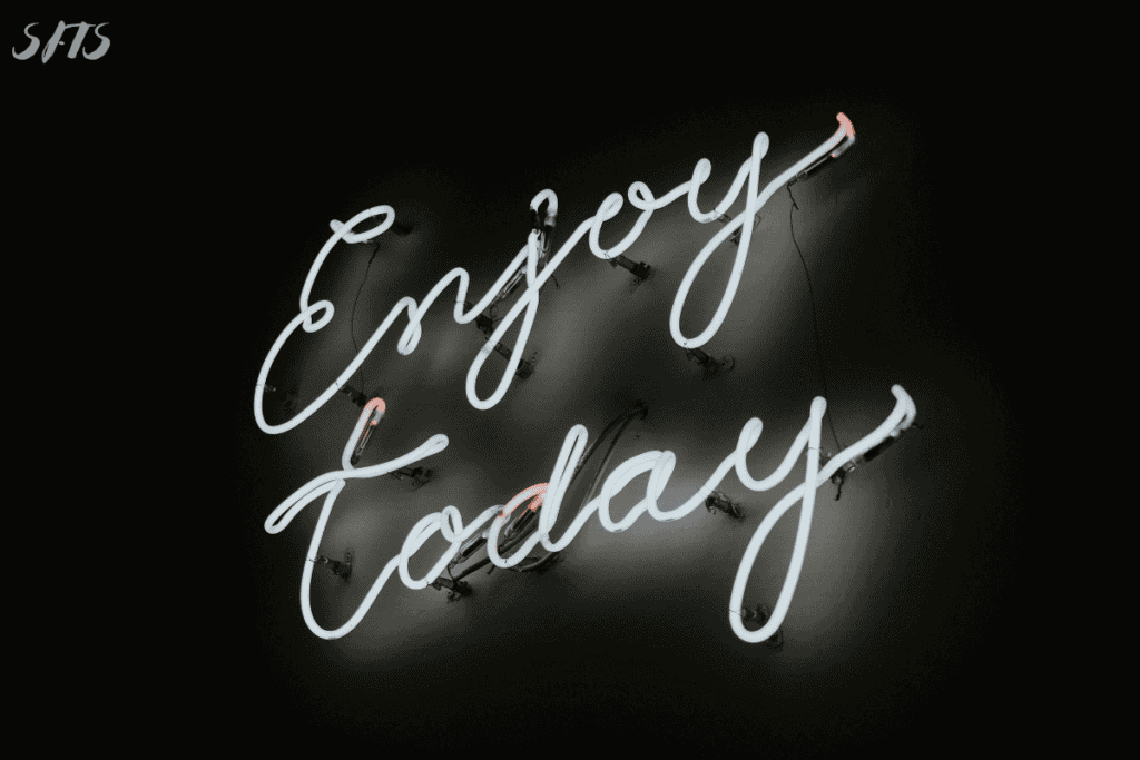 An image of an ENJOY TODAY neon sign.